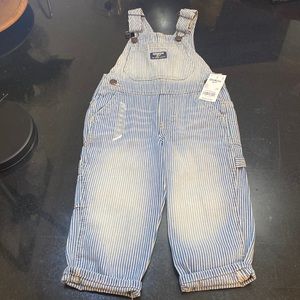 OshKosh B’gosh denim overalls